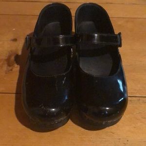 Women’s patent leather Mary Jane Dansko clogs